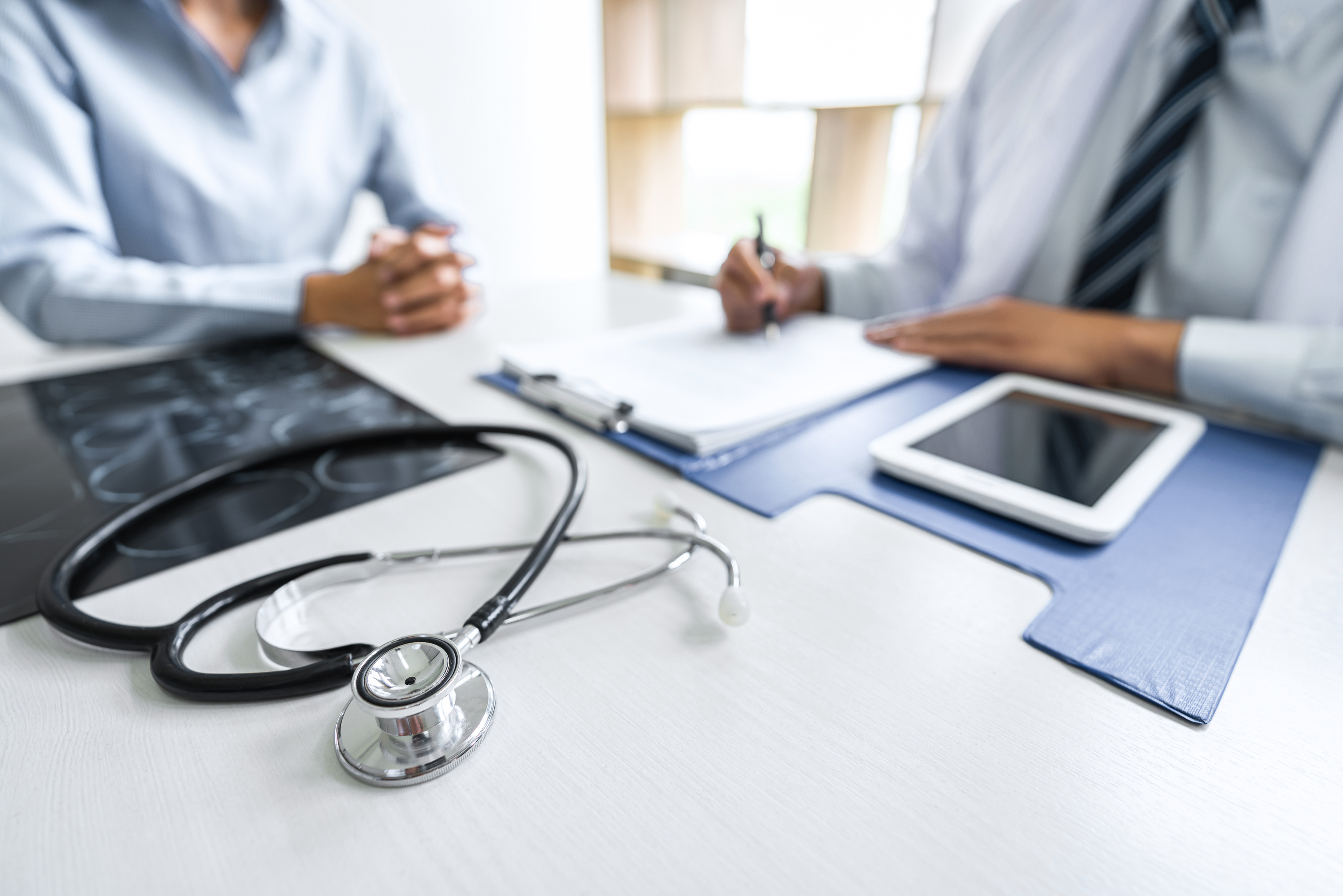 Doctor Consulting with Patient 